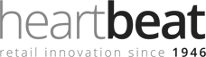 Logo featuring the text heartbeat in lowercase, with heart in light gray and beat in black. Below, it reads retail innovation since 1946 in smaller black text. Introducing Heartbeat Manufacturing—a legacy of quality and innovation.